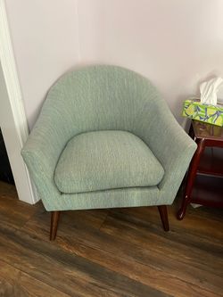 Green tub chair