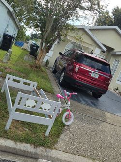 Free small child bed frame by the side of the road
