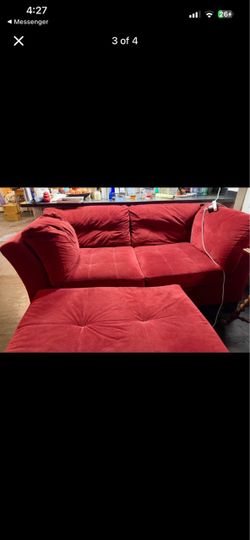 Red couch with ottoman