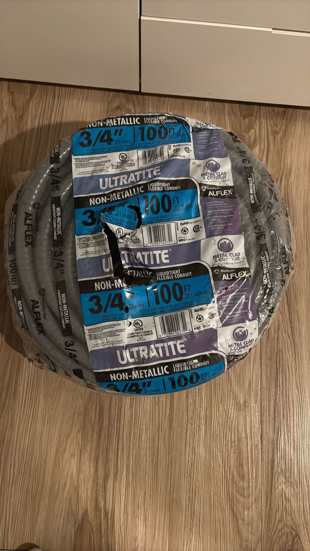 Non-metallic liquid tight flexible conduit