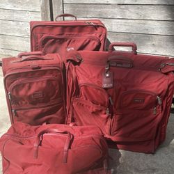 TUMI FOUR PIECE LUGGAGE SET