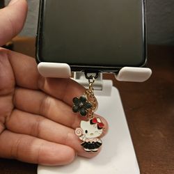 Character dust plug charms 