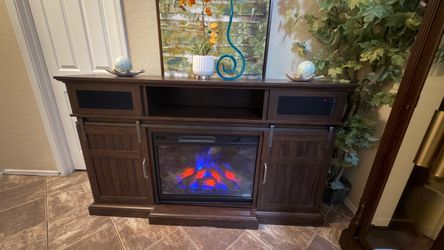 Beautiful fireplace/tv stand with 5 colors of flames 5 and Bluetooth speaker 68"
