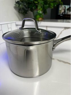 Calphalon pot w/lid in excelente use condition, life warranty