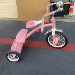 Pink tricycle