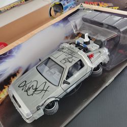 Back to the future autographed signed Delorean Michael j fox  Christopher Lloyd