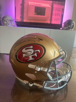 SF 49ers full sized authentic NFL helmet signed by Brock Purdy