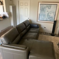 Grey LEATHER couch. Less than a 1 Year Old 