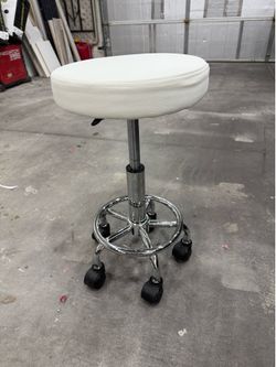 White stool on wheels