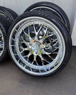 NEW staggered 24x9 and 24x11 chrome esko wheels wrapped in Lexani tires