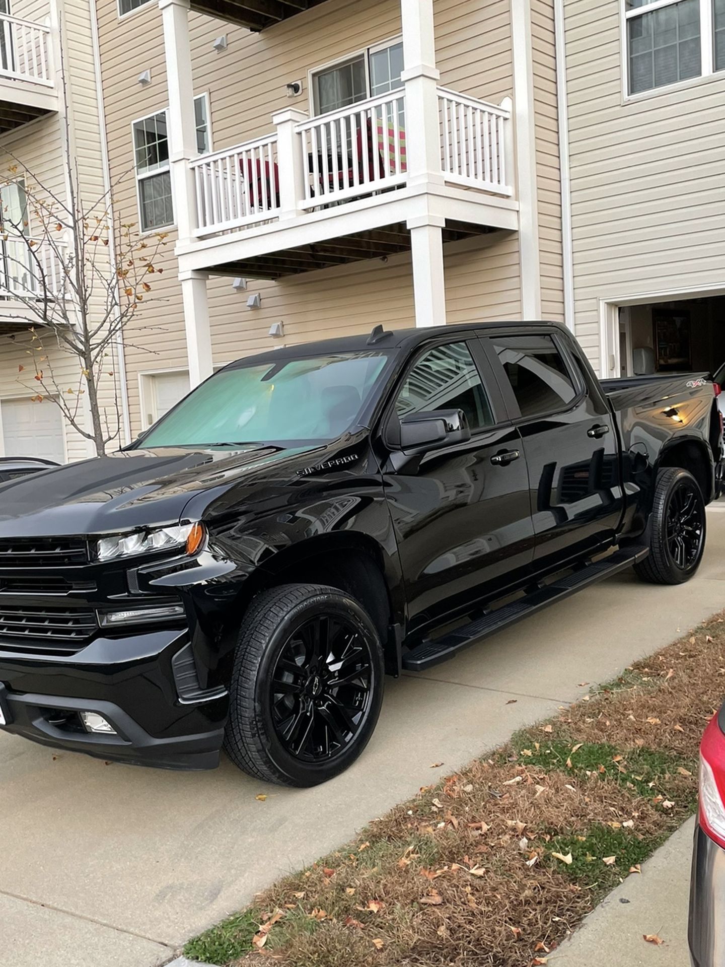 22 X 9 Inch Gloss Black OEM Chevy (GM) Wheels With Bridgestone Alenza All Season tires 275/50R22