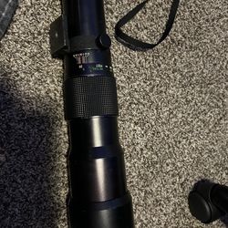 Black camera lens the brand is Vivitar￼