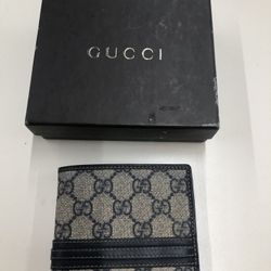 Gucci GG Supreme Canvas and Leather Bifold Wallet