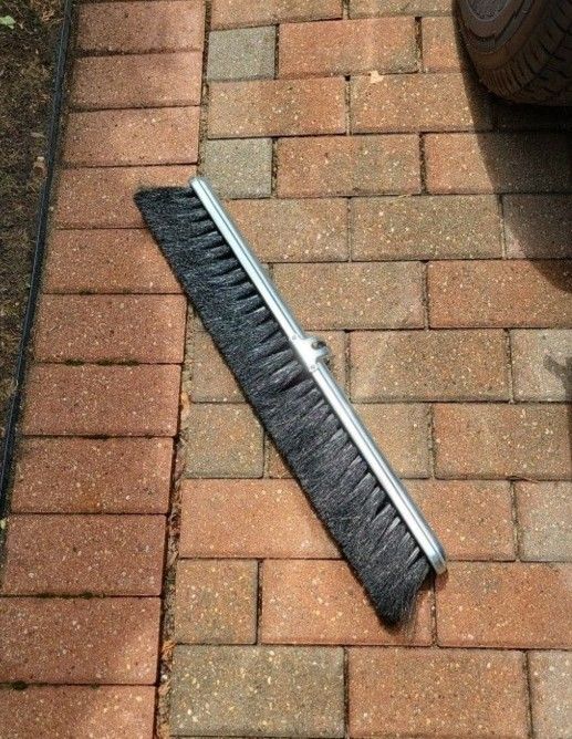 Brand New Milwaukee Dustless 24-in Broom Sweeper