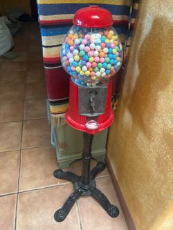 Vintage gumball machine with stand