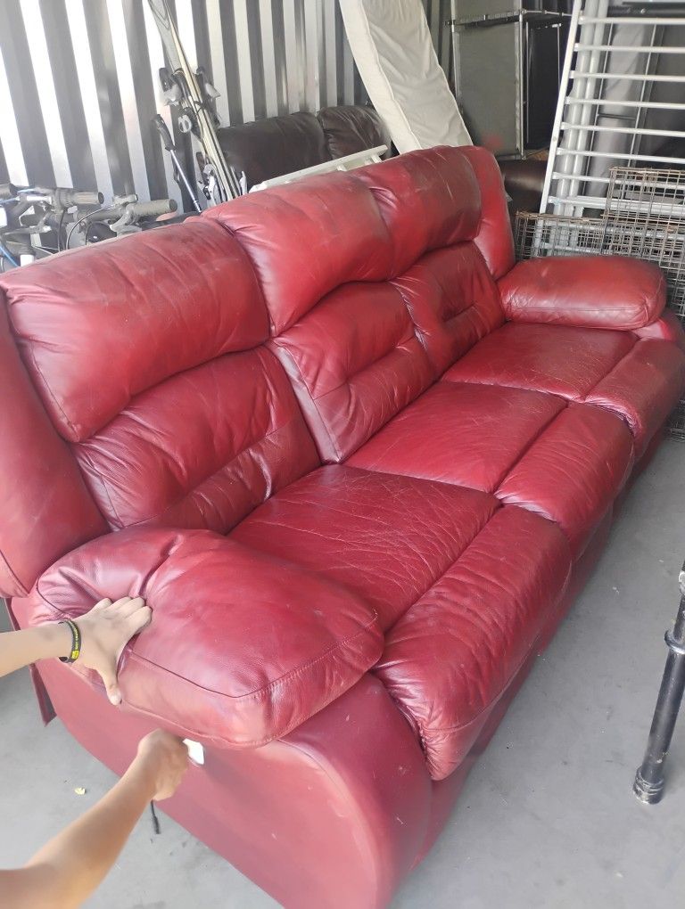 2 Leather reclining Sofas