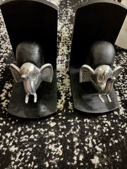 Black and silver elephant bookends