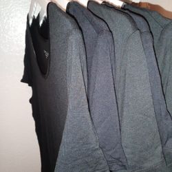 (12) Women's XL Black Stretch Short-Sleeve Shirts - $10 for All