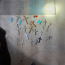 There's About 22 Pieces All Together Cross  Charms