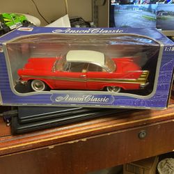 1957 Plymouth Fury Die Cast Scale  1/18 Brand New In Box All Doors, Trunk And Hood Open Perfect Condition 