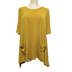 Logo by Lori Goldstein Womens Mustard Tunic Top Shirt Asymmetrical Hem Pockets.   Short sleeve  62% modal 38% polyester 21” across underarms  27” shou