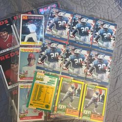 Barry Sanders and Pete Rose card lot. 51 cards all in pages.