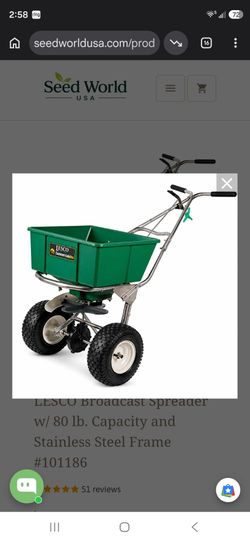 Spreader with deflector