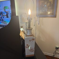 Vintage 1970s Porcelain Table Lamp – 31” Tall  Beautiful vintage porcelain lamp from the 1970s featuring hand-painted floral designs in warm iron-red 