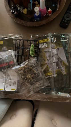3d printed knight figures and skeletons with a few loose pieces
