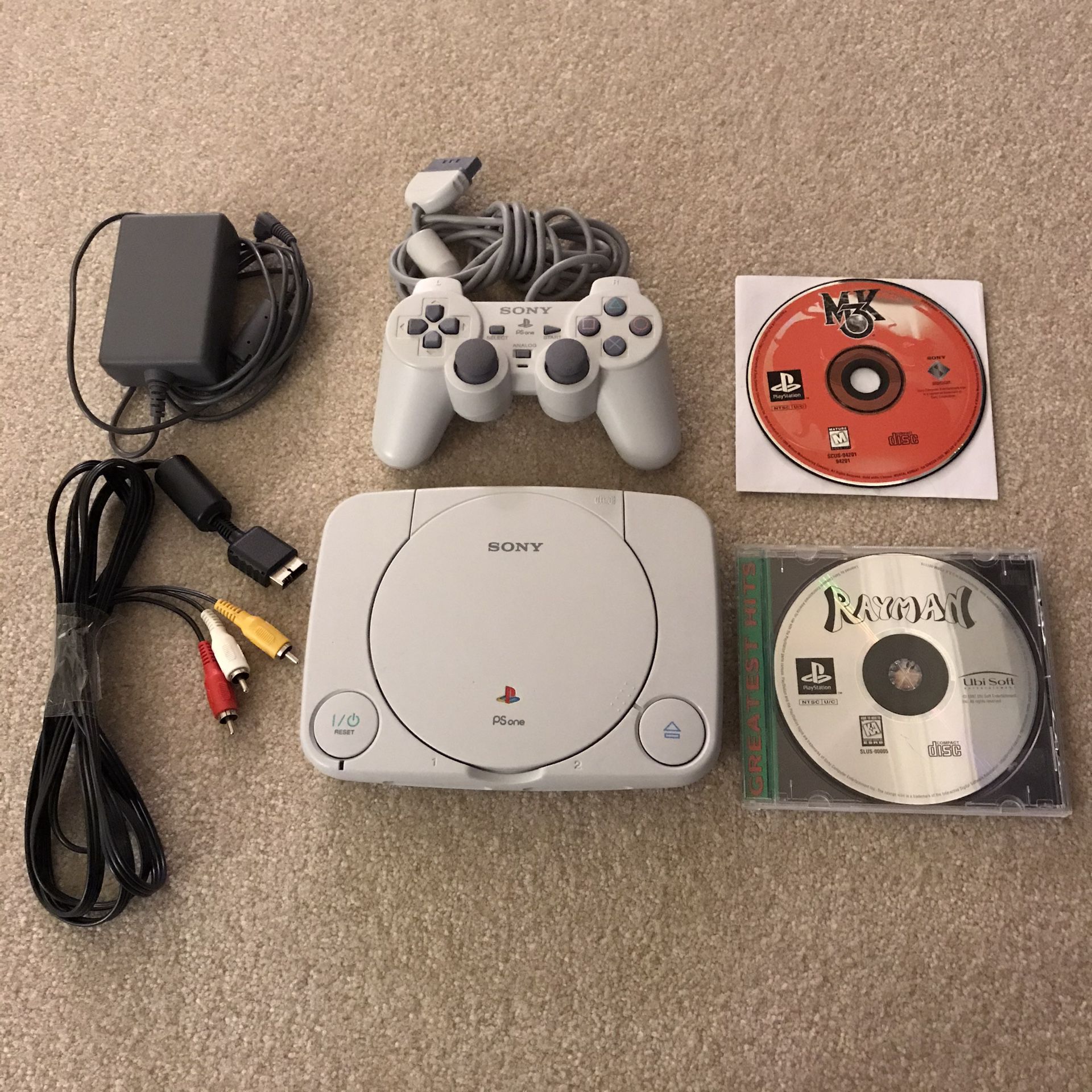 Playstation 1 psone ps1 system console with 2 video games rayman mortal kombat 3 controller cables