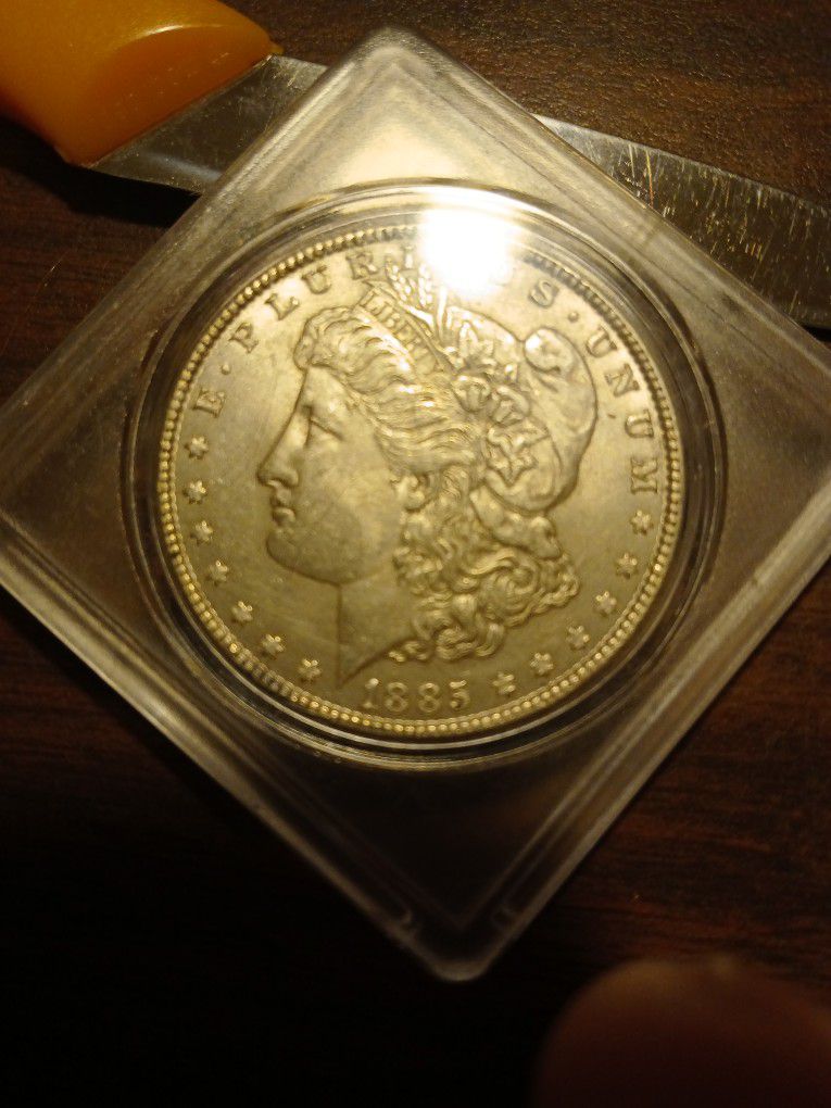 1885 Morgan Silver Dollar In AU Condition, In My Opinion.