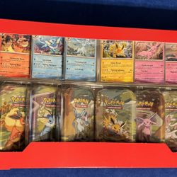Pokemon Prismatic Evolutions 8-Pack Mini Tins
