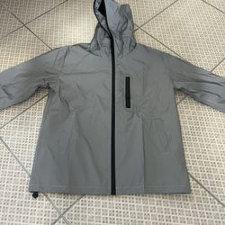 Reflective windbreaker $40