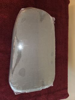 Compact ironing board. New in packaging.