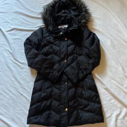 Black puffer jacket with faux hood. 