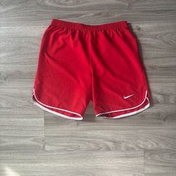 red nike shorts