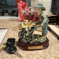 Porcelain Boy With Flower Cart 
