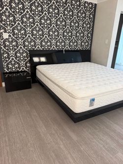 King size bed with mattress and nightstands and dresser