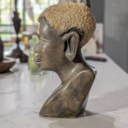 This is a Shona stone bust sculpture, hand-carved by an artist from the Shona tribe in Zimbabwe 