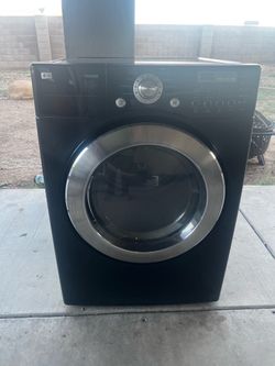 LG Tromm ultra-capacity gas dryer in good working condition.