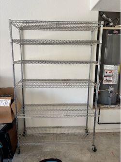 Large 6-Tier Chrome Wire Shelving Rack on Wheels  Price  $100 OBO