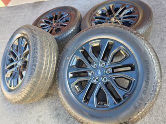 20" ford f150 black factory wheels and tires new