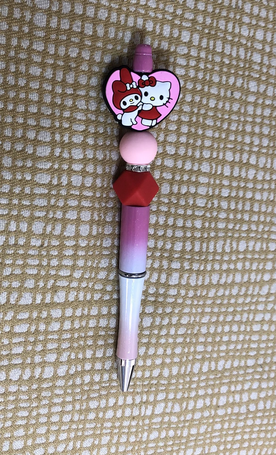Hello Kitty beads pen. Color pink purple . Size 6”LX 1” W
