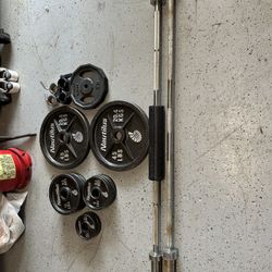 Gym, Weights, And 2  (45#) Bench Bars. 