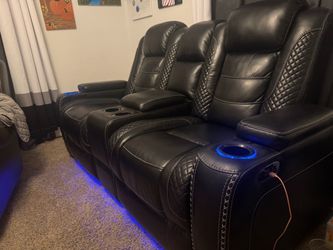 Leather reclining loveseat
