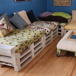 Custom Pallet Sectional with Futon Cushions and Movable Ottoman 