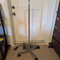 IV stand designed to securely hold bags or bottles of fluids and medication,