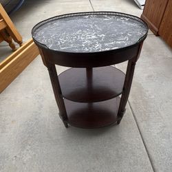 Antique Elegant side table with a marble top and two lower shelves