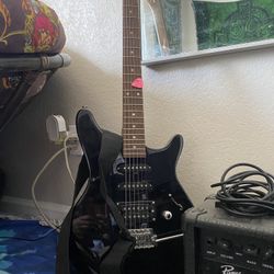 electric guitar w/strap, bag & amp !!!