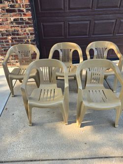 5 Plastic Outdoor chairs